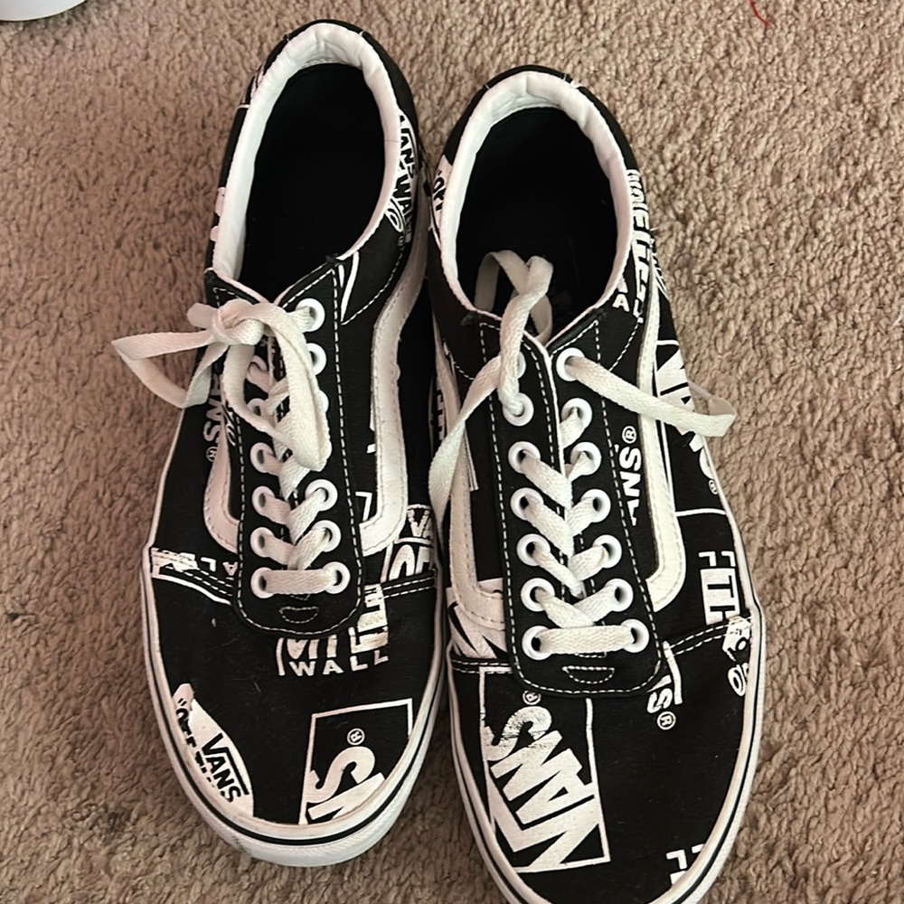 black van’s sneakers